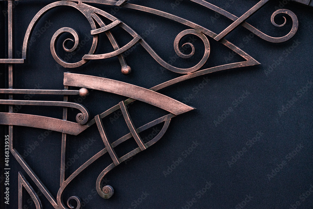 Beautiful decorative rectilinear forged elements of a metal gate