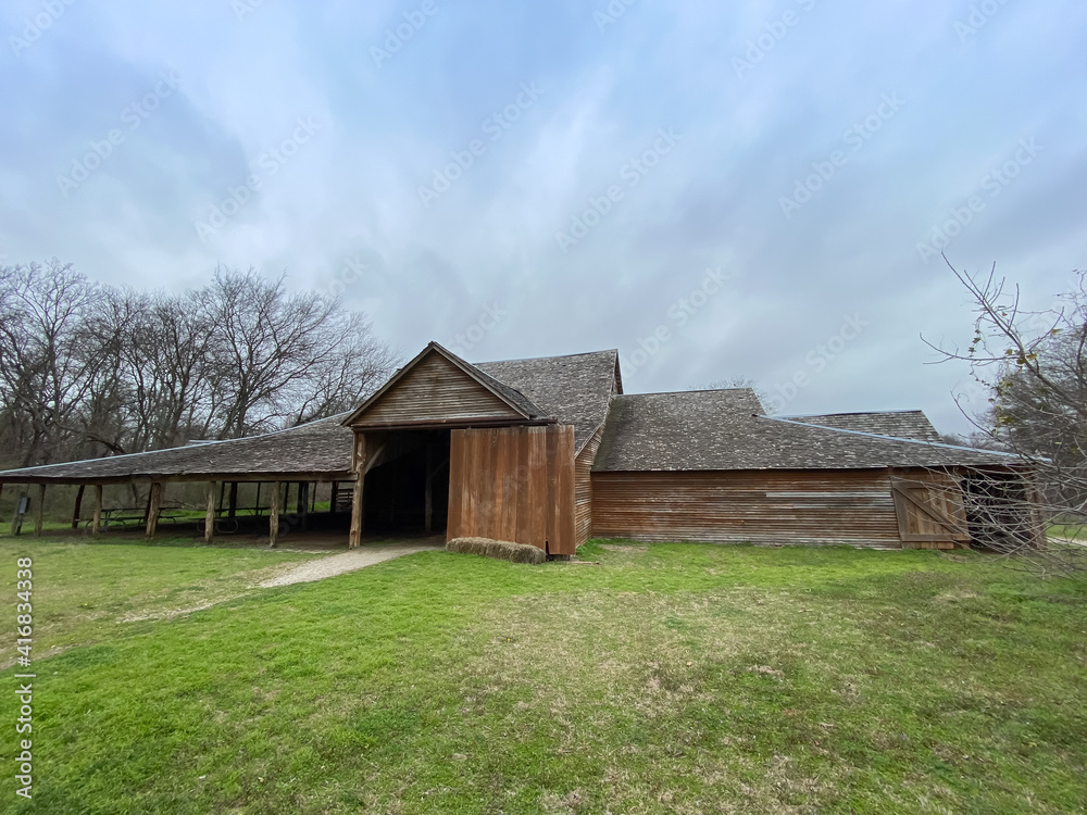 Large barn in a field Large barn in a field