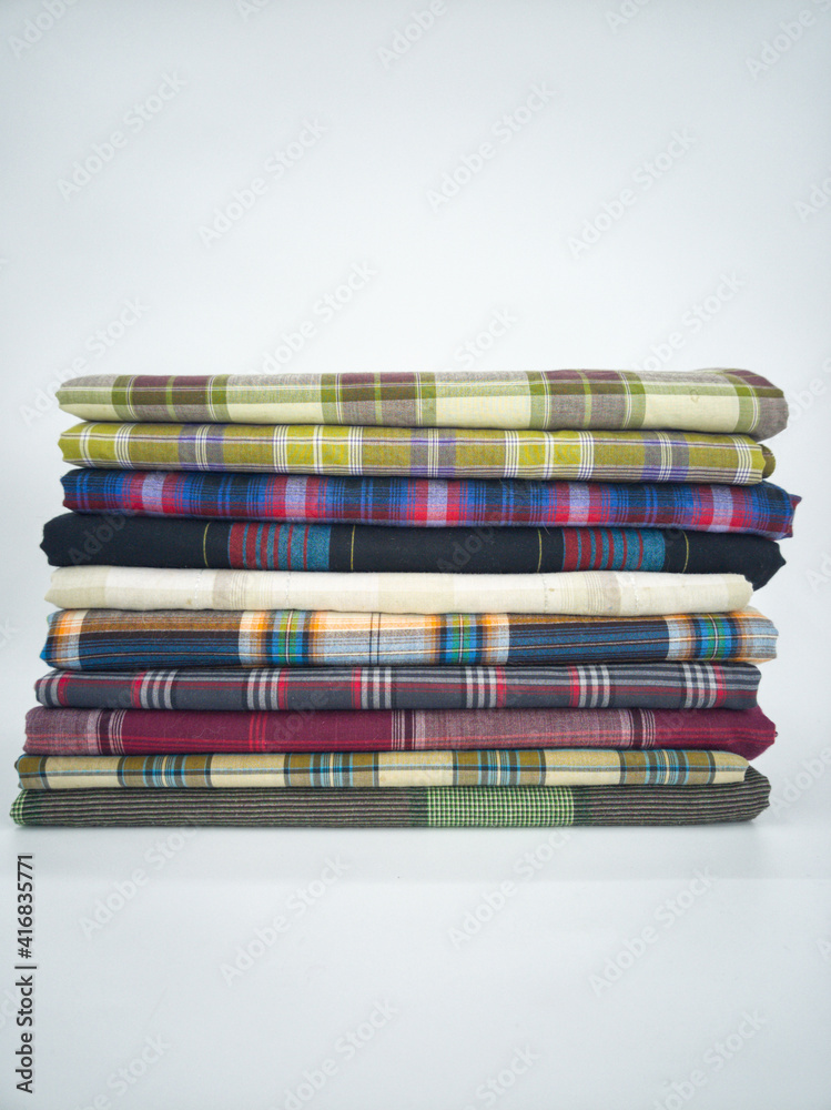 Naklejka premium Sarongs or locally known as kain pelikat, worn by most Asian men. Selective focus points