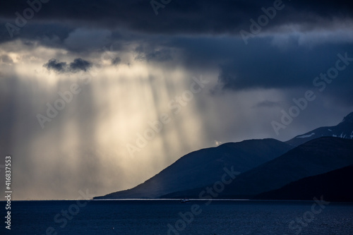 Chile, Patagonia. Rays of sunlight on Strait of Magellan. photo