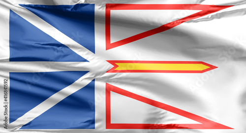 Flag of Newfoundland and Labrador The blue represents the waters of the sea, lakes and rivers; the white represents snow and ice; the red represents human effort. photo