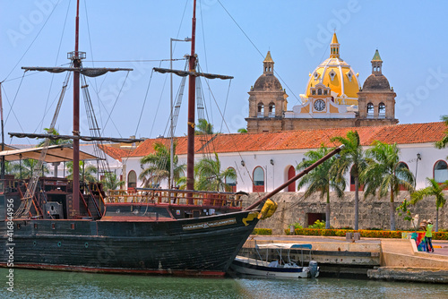 Old styled sail boat in the harbor and Iglesia de San Pedro Claver in the old town, Cartagena, UNESCO World Heritage Site, Bolivar Department, Colombia photo
