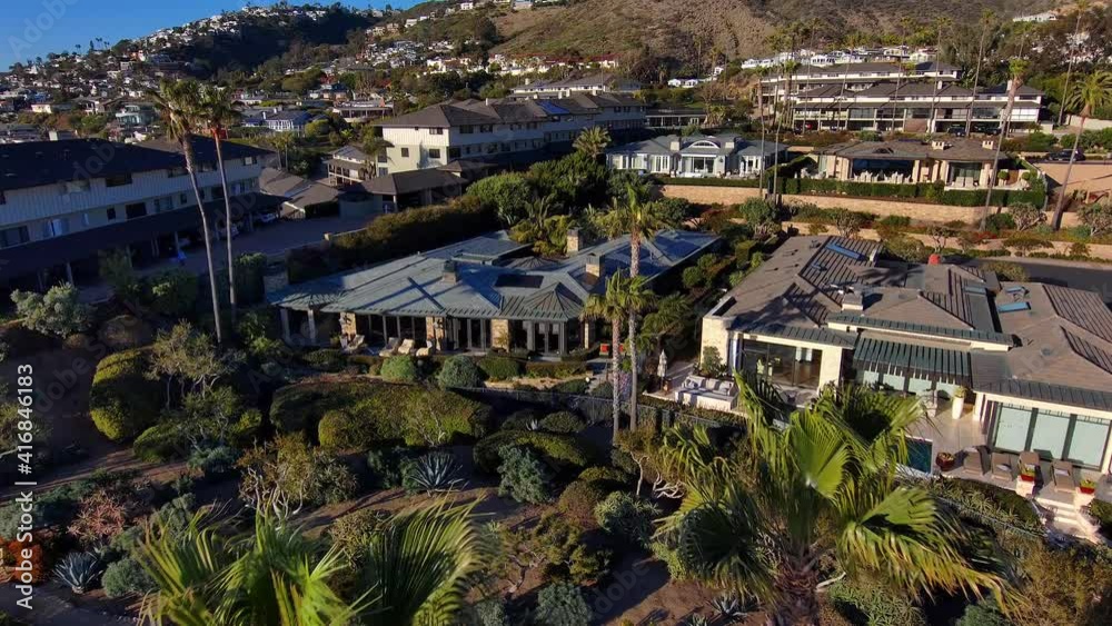 aerial reveal of high end housing in Laguna Beach, California aerial reveal of high end housing in Laguna Beach, California