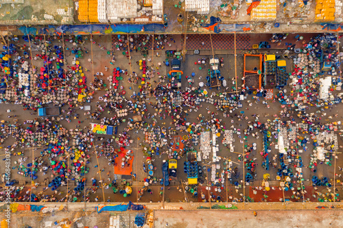 Aerial view of people working and trading at Rahman fish market along Karnaphuli river, Chittagong, Bangladesh.