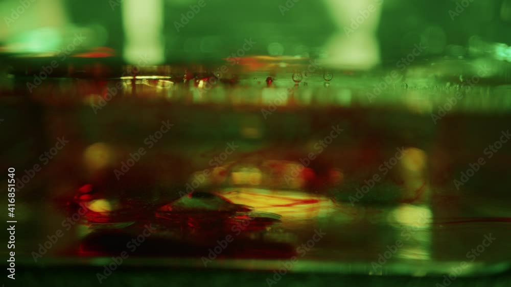 Abstract Pool of Water with Ink and Colorful Lights Abstract Pool of Water with Ink and Colorful Lights