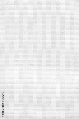 Close up white background plate with textile texture detail on it.