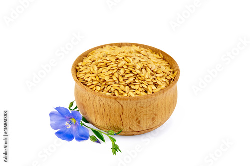 Flaxen white seed in bowl with flower