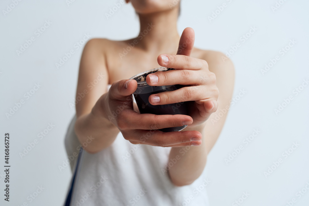 Woman in white towel black cream clean skin care Woman in white towel black cream clean skin care