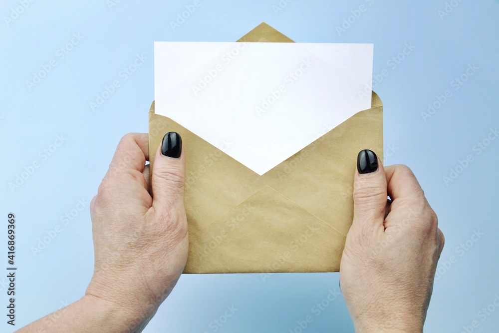 hand holding envelope