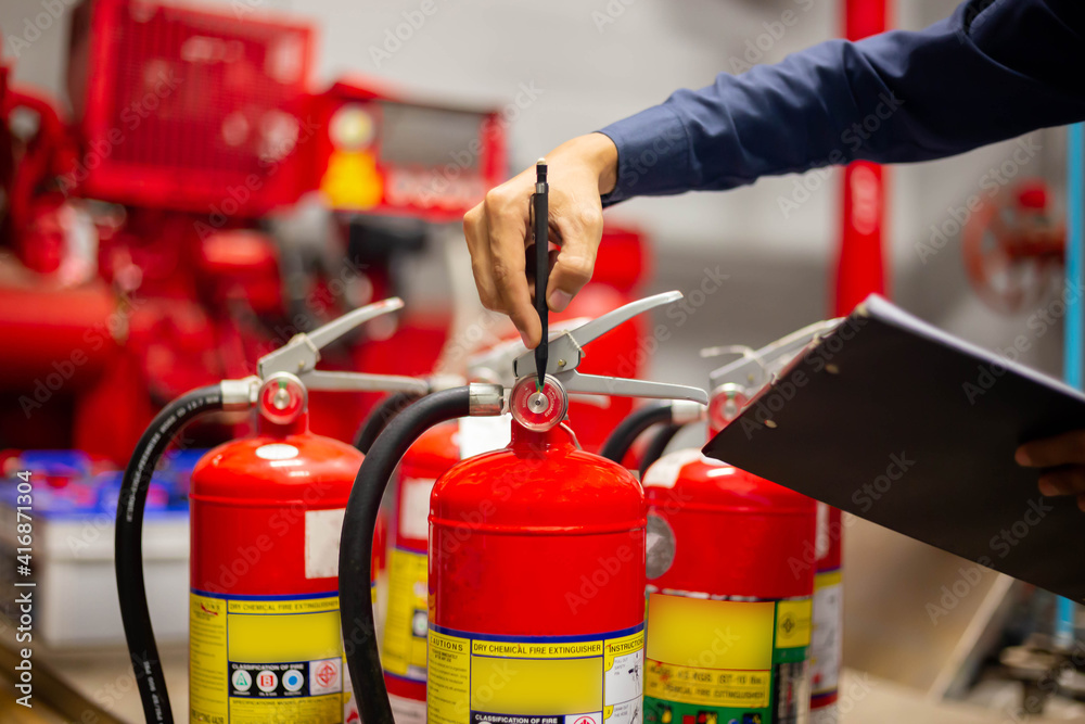 Engineer checking Industrial fire control system,Fire Alarm controller, Fire notifier, Anti fire.System ready In the event of a fire. Engineer checking Industrial fire control system,Fire Alarm controller, Fire notifier, Anti fire.System ready In the event of a fire.