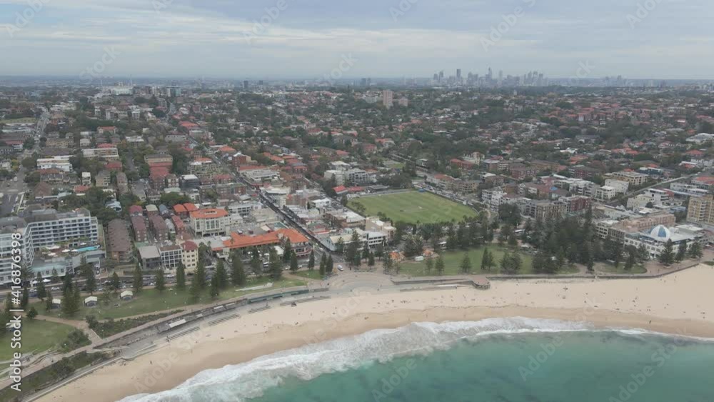Aerial View Of Eastern Suburbs In Sydney CBD - Coogee Surf Life Saving Club With Rockpool At Coogee Beach In New South Wales, Australia. - Pullback Shot Aerial View Of Eastern Suburbs In Sydney CBD - Coogee Surf Life Saving Club With Rockpool At Coogee Beach In New South Wales, Australia. - Pullback Shot