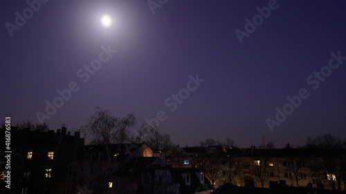 Moon is rising over the city of Berlin Adlershof Köpenick photo