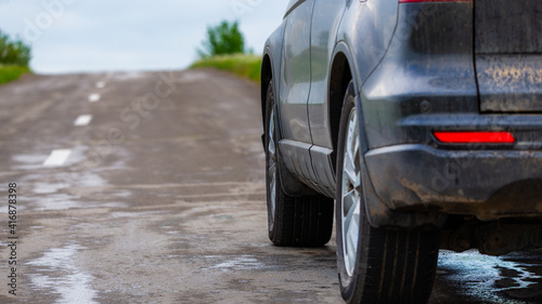 Car by the asphalt road