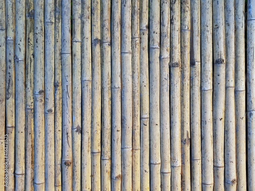 Old pile bamboo as wall background.