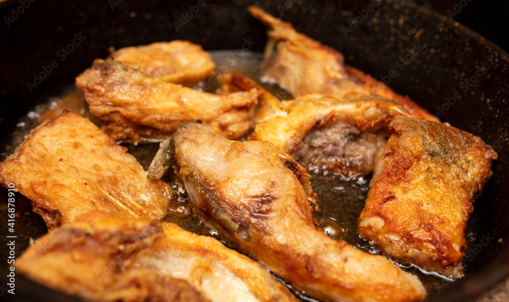 The fish is fried in oil