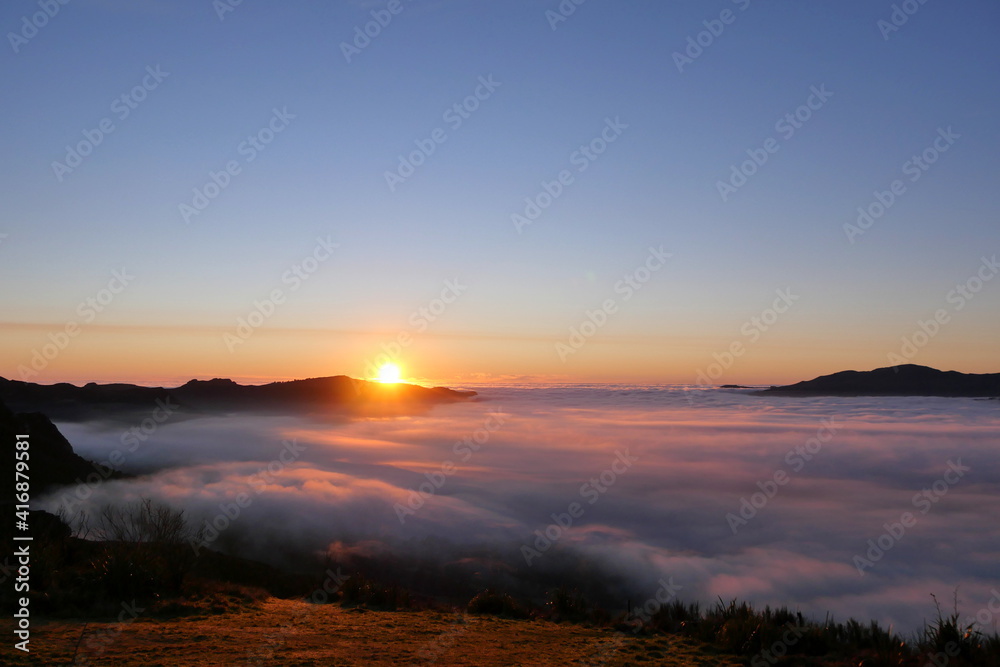 Majestic misty valley landscape during golden sunrise Majestic misty valley landscape during golden sunrise
