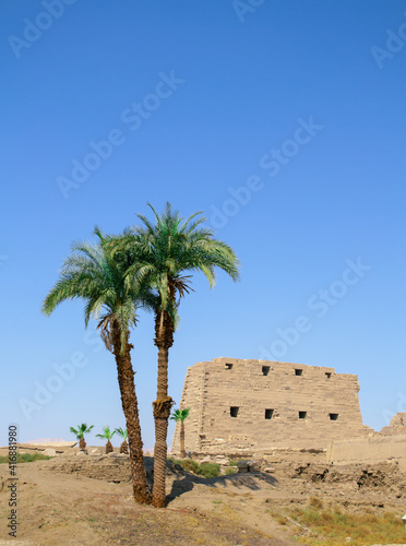 KARNAK TEMPLE - Massive columns inside beautiful Egyptian landmark with hieroglyphics  and ancient symbols. Famous landmark in the world near the Nile River and Luxor  Egypt