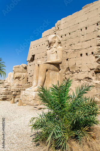KARNAK TEMPLE - Massive columns inside beautiful Egyptian landmark with hieroglyphics  and ancient symbols. Famous landmark in the world near the Nile River and Luxor  Egypt