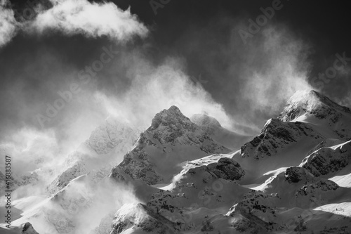 snow covered mountains with heavy wind © Marlies