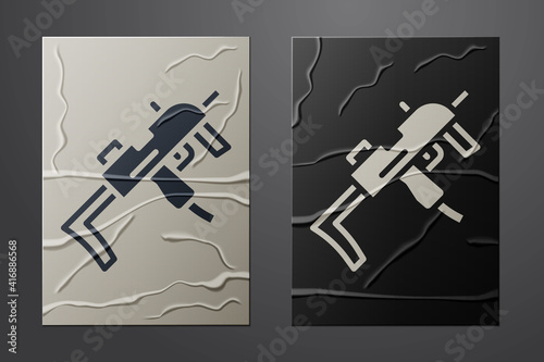 White MP9 submachine gun icon isolated on crumpled paper background. Automatic weapon. Paper art style. Vector.