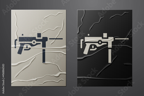 White Submachine gun M3, Grease gun icon isolated on crumpled paper background. Paper art style. Vector.