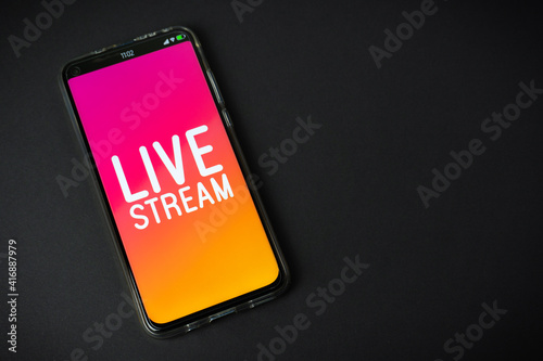 Phone with Live stream logo on black background