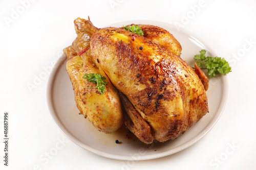 roasted chicken isolated on white background photo