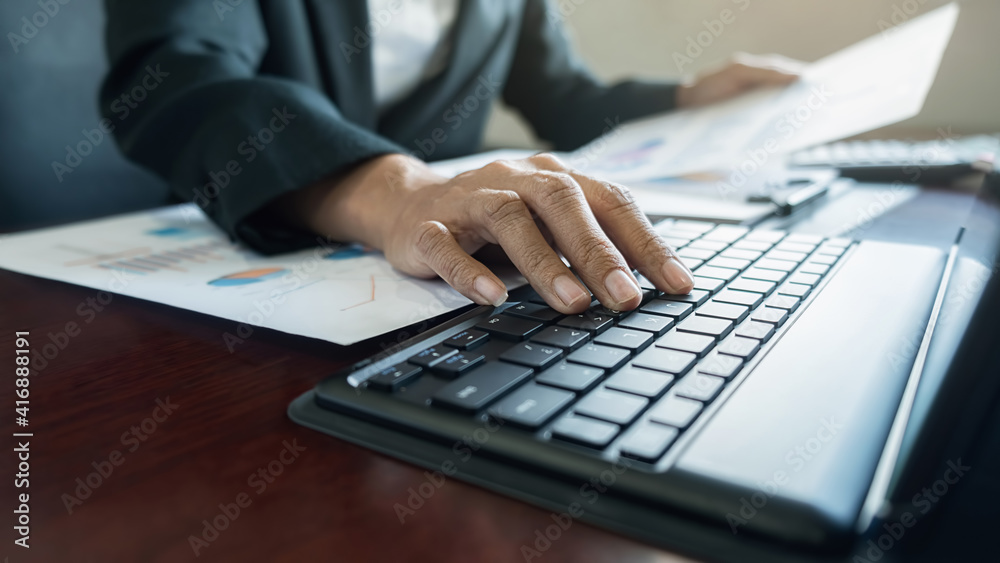 Administrator business man financial inspector and secretary making report calculating balance. Internal Revenue Service checking document. Audit concept