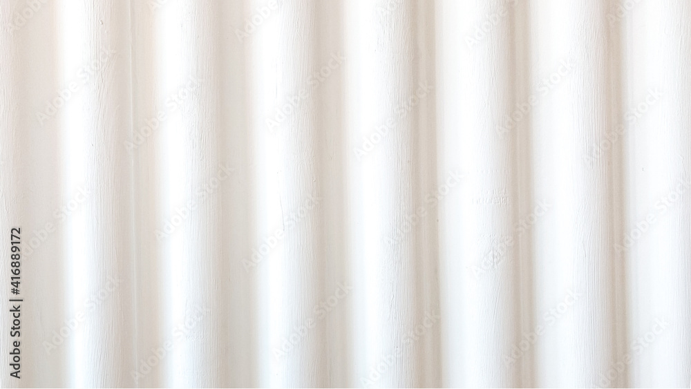 blur image - A white cement wall with a corrugated texture for background blur image - A white cement wall with a corrugated texture for background