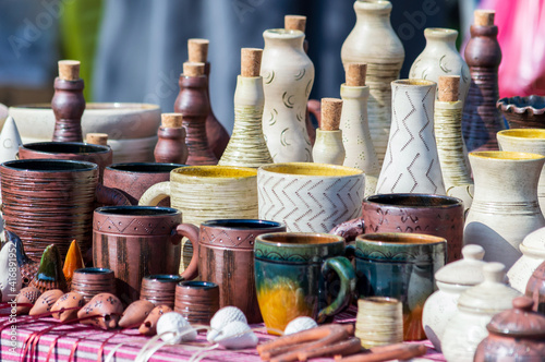 Clay bottles with corks. Colored earthenware.