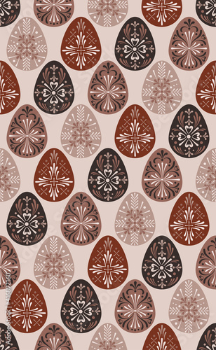 Easter folksy eggs seamless vector pattern. Illustration of decorative painted Boho Easter eggs for textile or wrapping surface. Traditional Easter ornament for Christian spring holidays.