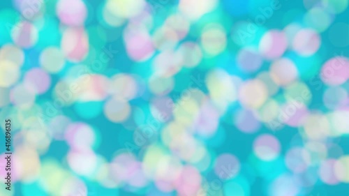Abstract bokeh background animation, blurry colorful circles glittering on blue, 4K interesting animation.