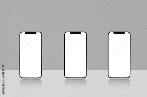 three blank mobile mockups with reflection