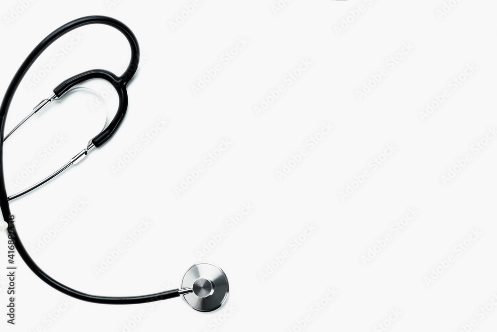 Black and silver doctor stethoscope isolated on white background with copyspace Black and silver doctor stethoscope isolated on white background with copyspace