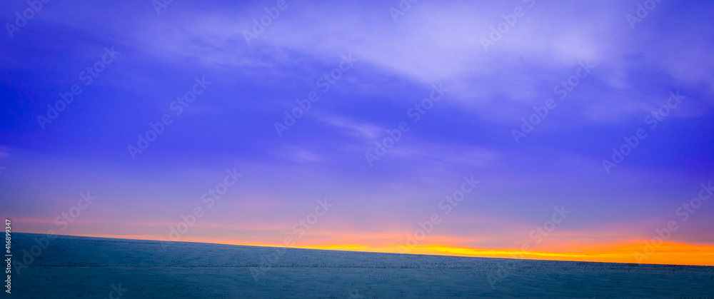 Beautiful blue sunset in the winter season.