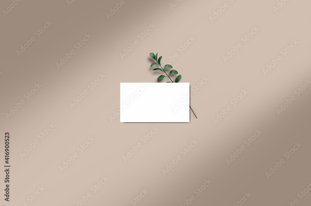 top view card mockup with a green leaf top view card mockup with a green leaf