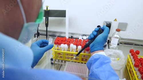 PCR test taking a sample from the tube coronavirus tube