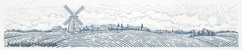 Rural landscape panoramic format with a Windmill. Hand drawn Illustration in engraving style.