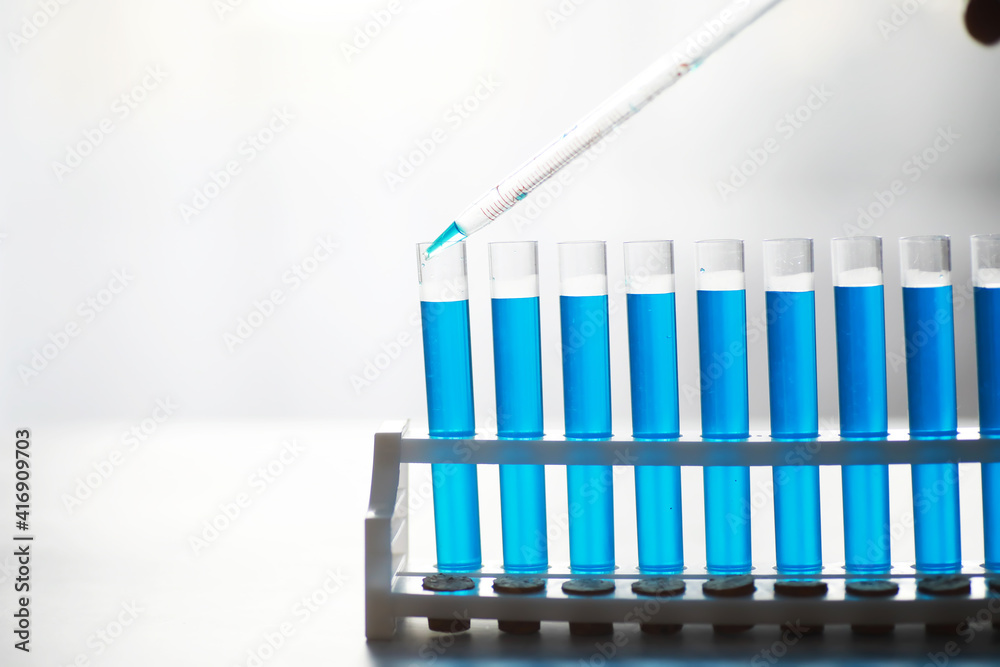 Vaccine vial search concept on table. Close up Vaccine flaskl for prevention,immunization and treatment. Vaccine vial search concept on table. Close up Vaccine flaskl for prevention,immunization and treatment.