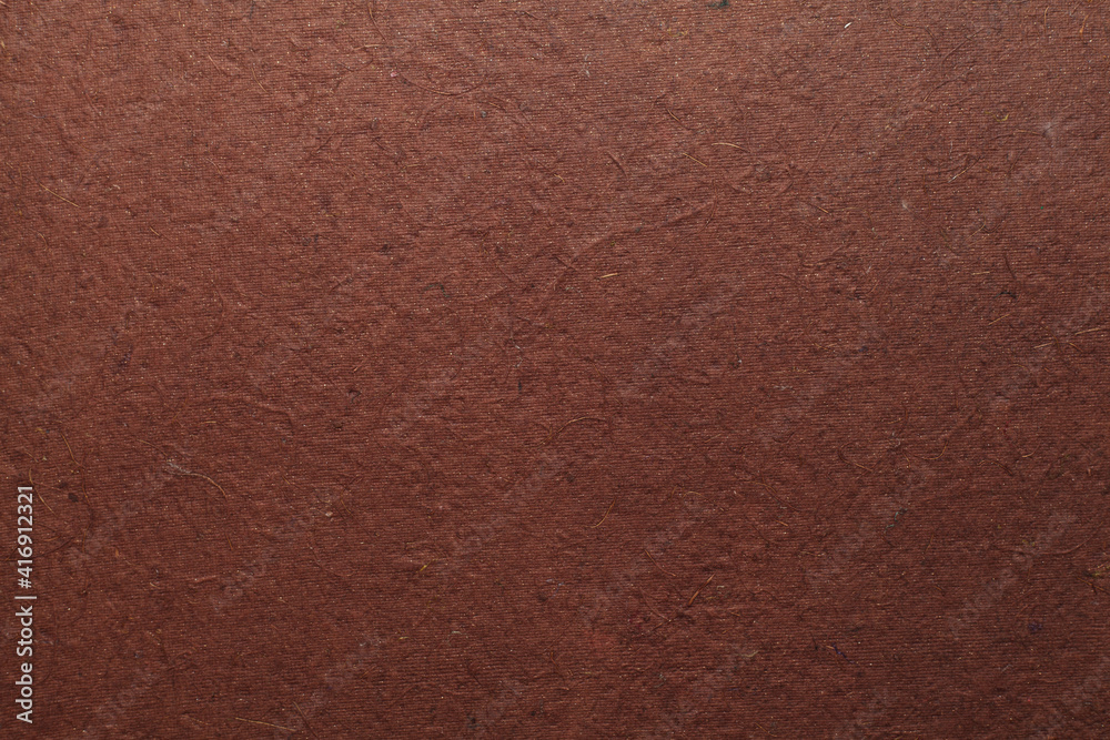 A beautiful brown color handmade paper of rough texture with veins and fibers. Useful for background, 3d rendering. A beautiful brown color handmade paper of rough texture with veins and fibers. Useful for background, 3d rendering.