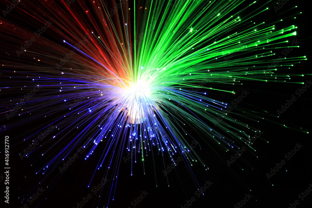 Light explosion effect background. Flying lights blue, red, green. Big bang effect. Fireworks. Light explosion effect background. Flying lights blue, red, green. Big bang effect. Fireworks.