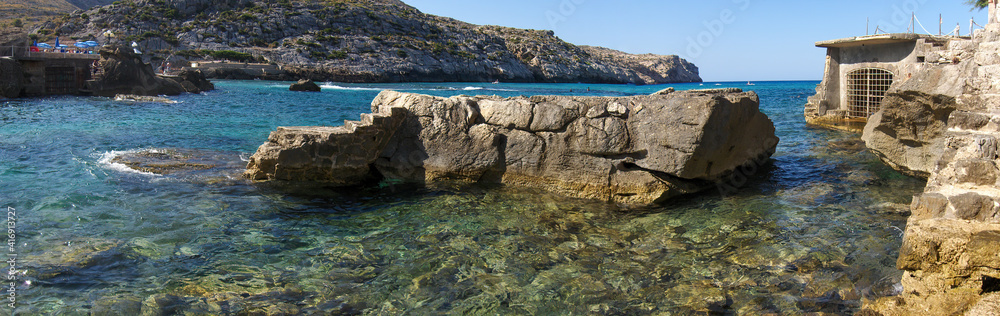 Rock in the sea in a cove on the island of Mallorca, Balearic Islands, Spain