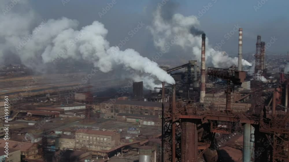 Large industrial metallurgical and chemical plant in Mariupol, Ukraine. Factory pollutes environment. Aerial view. Ecology disaster. Azovstal. Mariupol, Ukraine Large industrial metallurgical and chemical plant in Mariupol, Ukraine. Factory pollutes environment. Aerial view. Ecology disaster. Azovstal. Mariupol, Ukraine