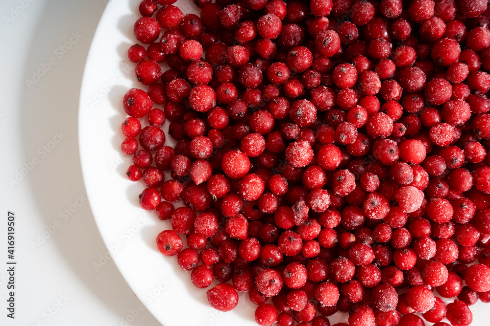 Frozen currants, berries background. Selective focus Frozen currants, berries background. Selective focus