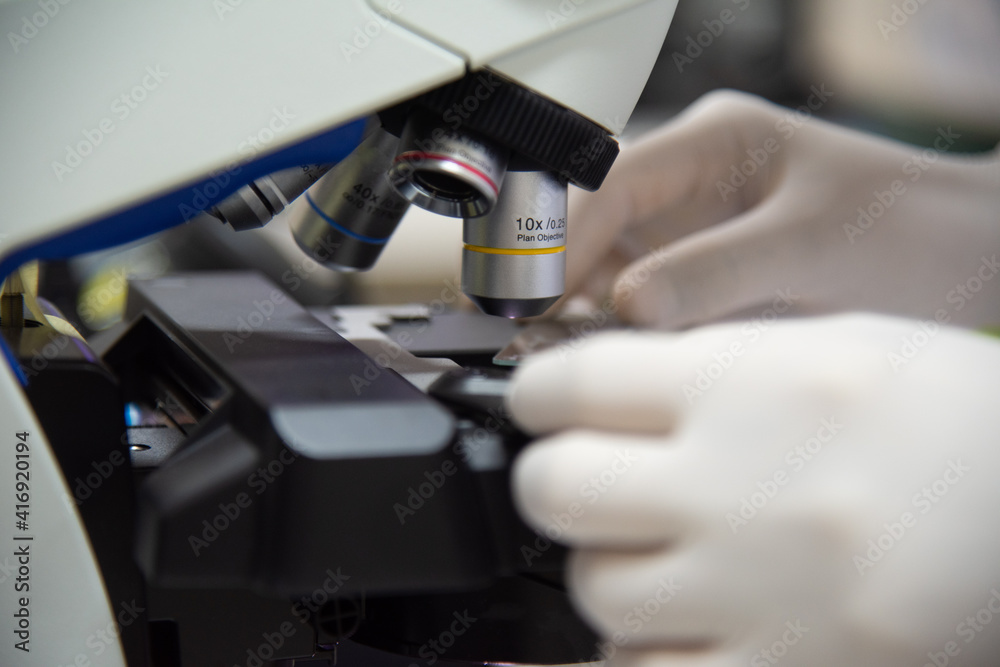 MIcroscope in laboratory with blur background. MIcroscope in laboratory with blur background.