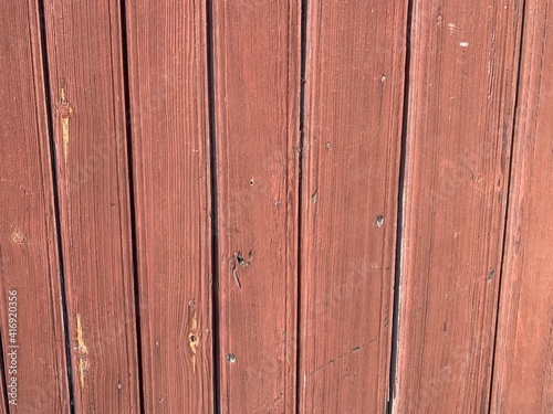 Texture of old wooden painted brown planks 