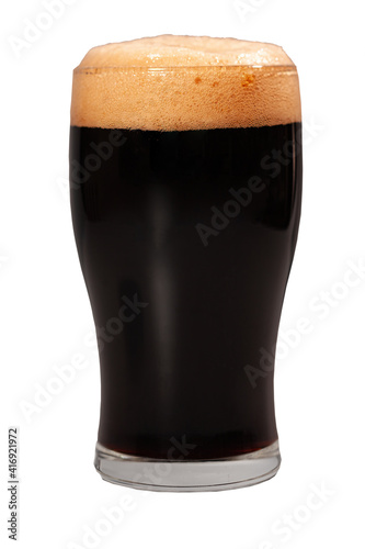 a glass of dark beer, isolated on a white background