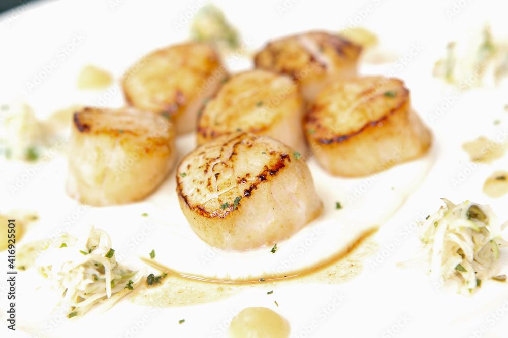 grilled scallop on plate
