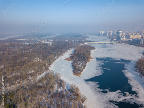 Wallpaper Mural Melting Dnieper River in spring Kiev. Ice crack on the river. Aerial drone view. Spring sunny morning. Torontodigital.ca