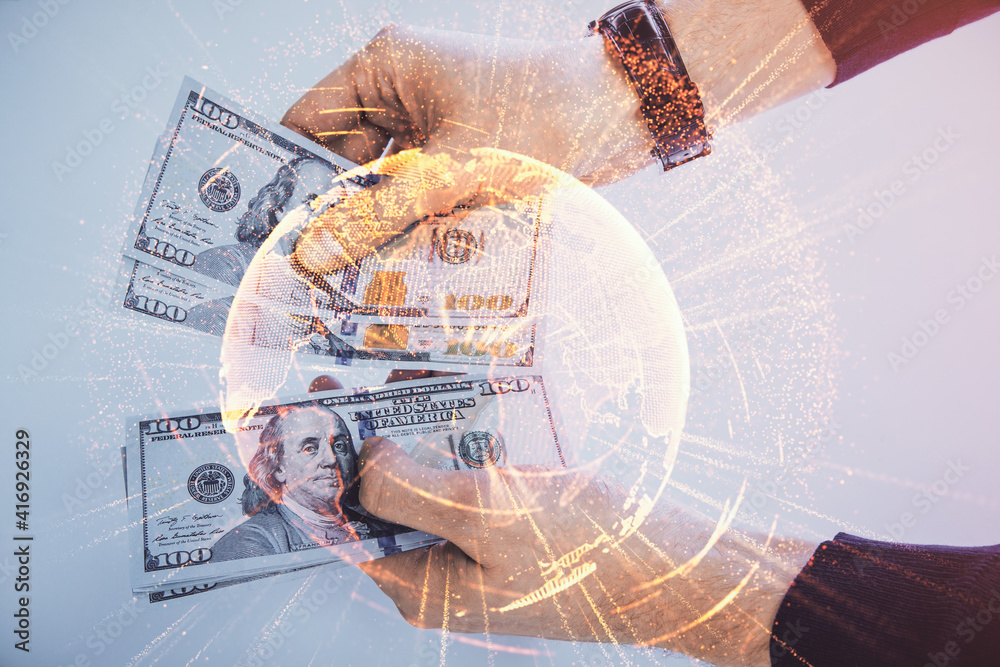 Multi exposure of social network theme drawing hologram and USA dollars bills and man hands. Multi exposure of social network theme drawing hologram and USA dollars bills and man hands.